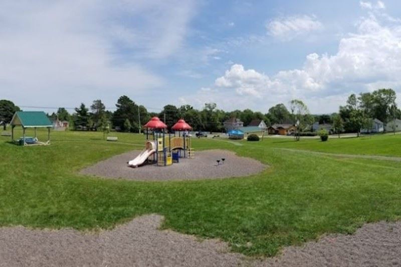 Broidy Park before the splash pad: a playground and open grass